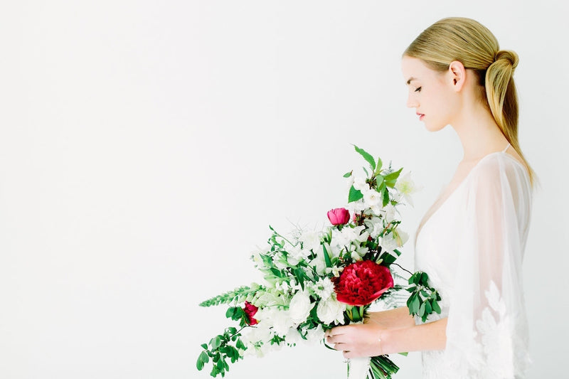 A girl holding fresh cut flowers